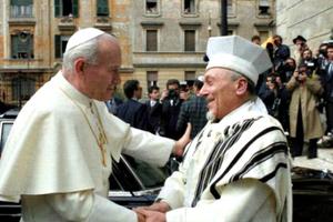 St. John Paul II embraces Elio Toaff, then the chief rabbi of Rome, April 13, 1986.