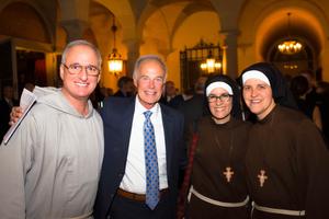 L to R: Father Bob Lombardo of the Franciscan Friars of the Renewal, Jeff Karls and Sisters Alicia and Kate from the Franciscans of the Eucharist of Chicago at the Institute on Religious Life Mystical Rose Gala in November 2019.