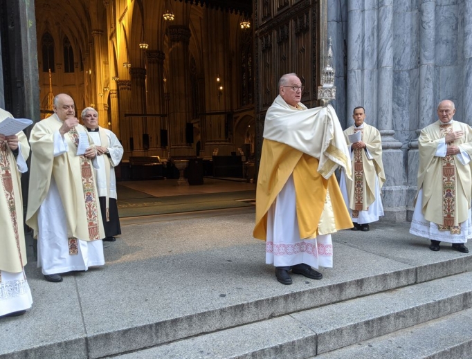 Cardinal Dolan blesses the empty streets of Manhattan just outside of St. Patrick's Cathedral, March 2020. Cardinal Dolan blesses the empty streets of Manhattan just outside of St. Patrick's Cathedral, March 2020.