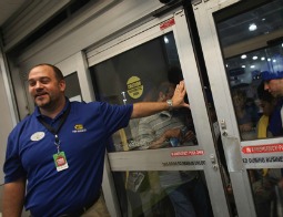 Shoppers wait to enter a Best Buy store on Nov. 25, 2011 in Naples, Fla.