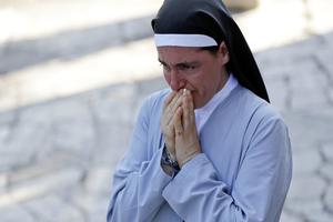 Sister Marjana Lleshi gets emotional during an interview with The Associated Press in Ascoli Piceno, Italy, on Aug. 25. Sister Marjana was one of three nuns and an elderly woman who survived the earthquake that hit central Italy early Wednesday, when she escaped a collapsing convent in Amatrice, a medieval hilltop town. 