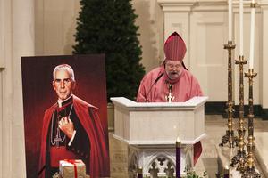 Peoria Bishop Daniel Jenky gives a homily at a Mass at Cathedral of St. Mary of the Immaculate Conception in Peoria, Illinois. A bid for more than a decade to canonize the late archbishop, an Illinois native, has stalled indefinitely because the Archdiocese of New York and the Diocese of Peoria continue to squabble over the disposition of the archbishop's remains. 