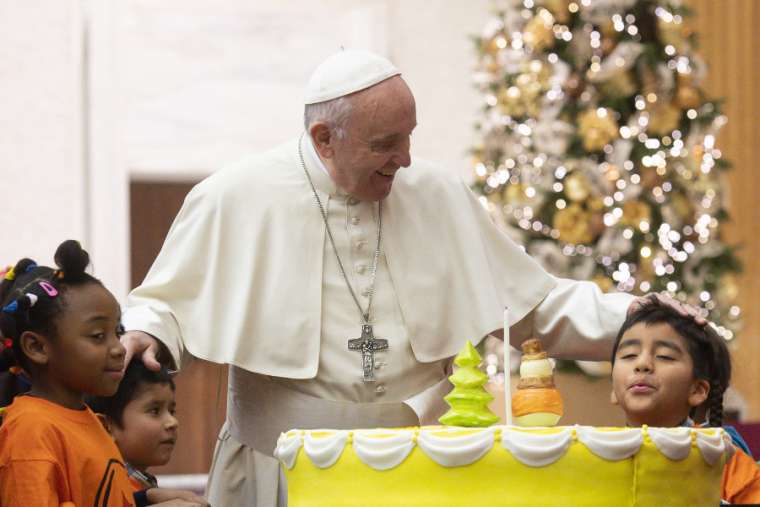 Pope Francis celebrates his 82nd birthday a day early with young patients of the Santa Marta Pediatric Dispensary Dec. 16.