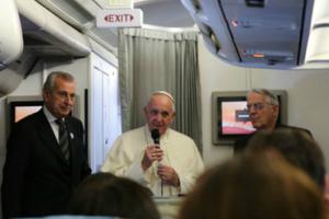 Pope Francis speaks with journalists aboard the plane to Manila on Jan. 15.
