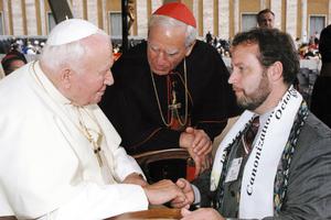 Bob Gutherman and Cardinal Anthony Bevilacqua greet Pope St. John Paul II at St. Katharine Drexel's canonization ceremony in 2000.