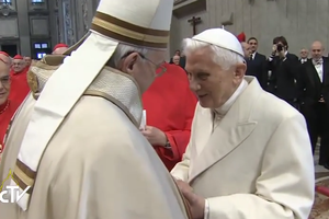 Pope Francis greeted Pope Emeritus Benedict XVI on entering St. Peter's basilica.