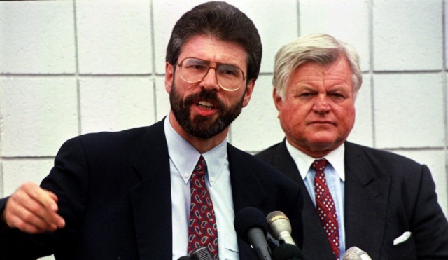 Sen. Edward Kennedy stands beside Sinn Fein leader Gerry Adams as he talks to reporters in Boston in September 1994.
