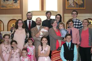 The Ekblad family at baby Jude’s baptism at Christ the King Catholic Church in Ann Arbor, Michigan. 