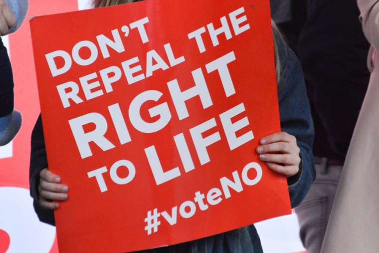 Sign from the ‘Save 8 Rally’ in Ireland March 10. 