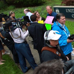 Members of the U.S.-based Survivors Network of those Abused by Priests, or SNAP, are interviewed by members of the media outside the U.S. Conference of Catholic Bishops headquarters in Washington May 18. The bishops unveiled the long-awaited study on the causes of sexual abuse committed by American priests. 