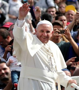 Pope Francis waves from the popemobile in St. Peter's Square on Oct. 13.