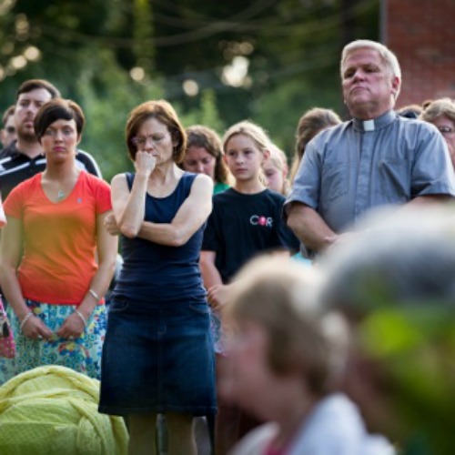 Parishioners from Blessed Teresa of Calcutta Cruch in Ferguson, Mo., gather for a prayer vigil for peace after the Aug. 9 killing of Michael Brown.
