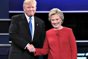 Donald Trump and Hillary Clinton shake hands before Monday's presidential debate.