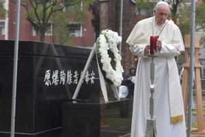 Pope Francis prays at the Nagasaki ground zero site on Nov. 24.