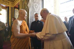 Pope Francis greets His Holiness Somdej Phra Maga Muneewong at the Wat Ratchabophit Sathit Maha Simaram Temple in Bangkok Nov. 21. 