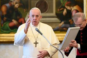 Pope Francis offers a blessing during his weekly General Audience on June 24, 2020. 