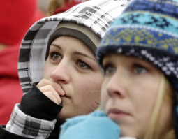 Emily Mosher and Katy Nolan, students at Clarion University in Pennsylvania, listen to a woman talk about her experiences with an abortion, during the annual March for Life rally on the National Mall in Washington Jan. 22.