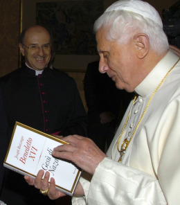 Pope Benedict peruses a newly published copy of Jesus of Nazareth.