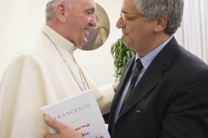 Pope Francis with Italian journalist Andrea Tornielli during the book debut of The Name of God Is Mercy on Jan. 12.