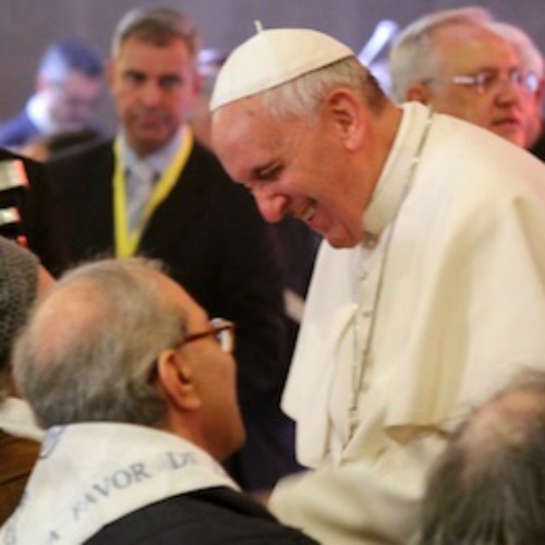 Pope Francis greets the elderly and disabled following his Holy Thursday Mass at Rome’s Don Gnocchi facility.
