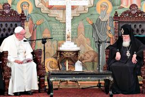 Pope Francis meets with Georgia Orthodox Patriarch Ilia II in Tbilisi, Georgia, Sept. 30, during his papal visit to the country.