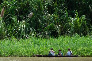 Children go to school by canoe on the Maranon River, a main tributary of the Amazon River in the Pacaya Samiria National Reserve, on May 24. The upcoming Pan-Amazonian synod will address issues of importance to the Church in the Amazon region.
