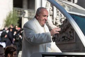 Pope Francis waves to pilgrims during his April 19 general audience in St. Peter’s Square. 