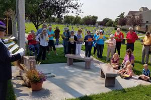 People gather in prayer on past National Days of Remembrance for Aborted Children: Billings, Montana, 2018 (above); and Hillside, Illinois, 2018 (below); and Scranton, Pennsylvania, 2017 (below). This year the date is Sept. 14. Below, memorial wreaths are set up at a special Mass via Elizabeth Ministry; and the Ray family is shown mourning a miscarried family member.
