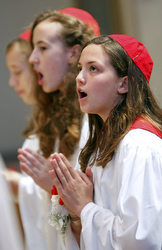 Girls sing at a Tridentine Mass celebrated last year by Bishop William Murphy of Rockville Centre, N.Y.