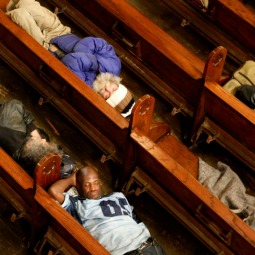 Homeless men sleep in the pews at St. Boniface Church in San Francisco's Tenderloin neighborhood.