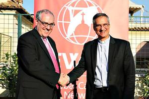 EWTN CEO and National Catholic Register Publisher Michael Warsaw and Msgr. Dario Viganò, prefect of the Secretariat for Communications, celebrate the dedication of the EWTN News Rome Bureau, Sept. 29.