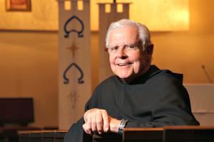 Franciscan Father Michael Scanlan, who died Saturday morning at the age of 85, is shown in Franciscan University of Steubenville's Christ the King Chapel. Below, he addresses attendees as a Franciscan summer conference; meets with Pope John Paul II at the Vatican in 1986; and he presents the university's Poverello Medal to Mother Teresa of Calcutta, with Steubenville Bishop John King Mussio, in 1976.   