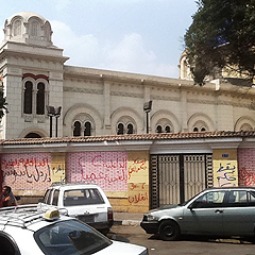 Anti-Christian slogans are painted on a wall outside Cairo's Saint Cyril Church in August 2013.

