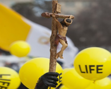 MILLIONS BABY MARCH.March for Life participants make their way up Constitution Avenue to the Supreme Court building in Washington Jan. 22. The annual anti-abortion demonstration marks the 1973 Supreme Court decision that legalized abortion across the nation.