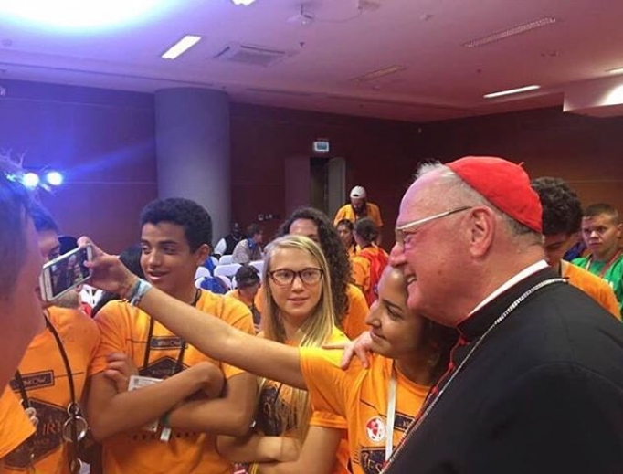 Cardinal Timothy Dolan with WYD pilgrims from New York in Krakow. 