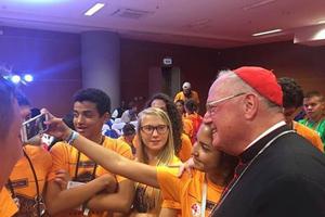 Cardinal Timothy Dolan with WYD pilgrims from New York in Krakow. 