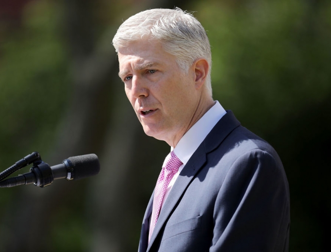 U.S. Supreme Court Associate Justice Neil Gorsuch delivers remarks after taking the judicial oath during a ceremony in the Rose Garden at the White House April 10 in Washington. 