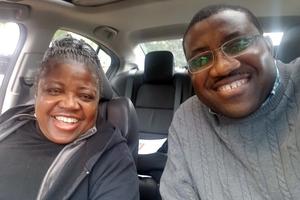 Father Henry Atem and his mother