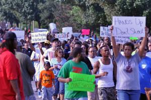 Protest march in Ferguson, Mo., following the August death of Michael Brown, who was fatally shot during a confrontation with Ferguson police officer Darren Wilson.