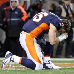 Denver Broncos quarterback Tim Tebow prays after the Broncos defeated the Pittsburgh Steelers in overtime in the NFL AFC wildcard playoff game in Denver Jan. 8. 
