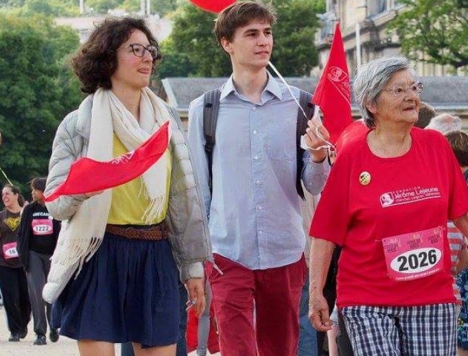 Birthe Lejeune walks with granddaughter Emma Lejeune at the Course des Héros in 2016.