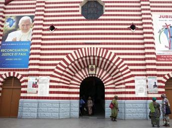 Worshipers leave the Notre Dame cathedral Nov. 17 after morning Mass in Benin's economic capital Cotonou.