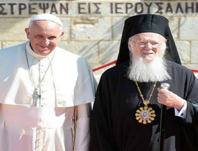 Pope Francis and Ecumenical Patriarch Bartholomew stand together in the courtyard of the Patriarchate of Jerusalem's summer residence at Little Galilee, 2014.