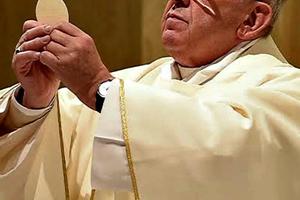 Pope Francis celebrates Mass in the chapel of the St. Martha residence on April 18.