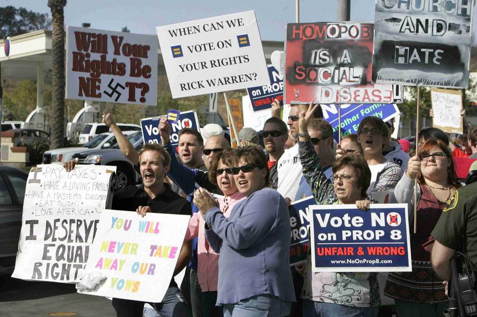 Homosexual protesters demonstrate last month at Rick Warren's Saddleback Churchin Lake Forest, Calif.