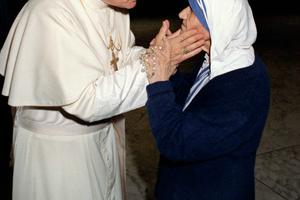 Pope St. John Paul II with Mother Teresa in 1988.