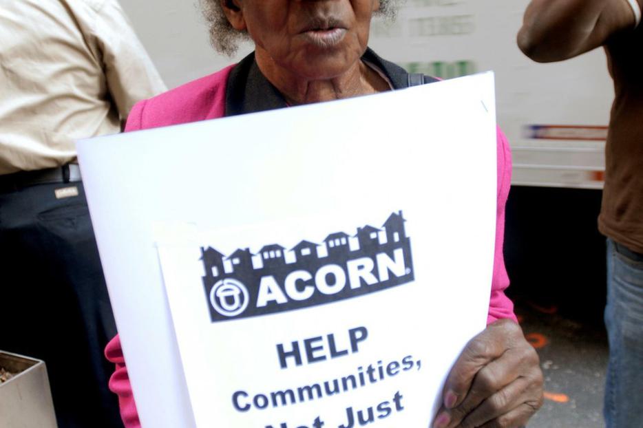 Protester demonstrates Sept. 23 outside the Federal Reserve Bank of New York.