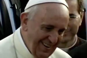 Pope Francis smiles as he greets people at his welcoming ceremony after arriving Nov. 27 in Entebbe, Uganda.