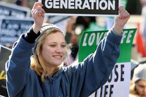Students for Life display signs at the annual March for Life in Washington, D.C., 2019. 