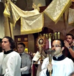 Father Michael Drea leads the Eucharistic procession in the Church of St. Paul in Harvard Square, Cambridge, Mass.